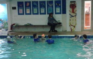 Ciaran, Dela and August in a rare moment side by side in the pool.